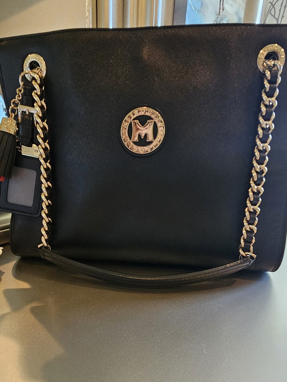 Black Metro City Leather Tote with Gold Chain Accents - Emblem